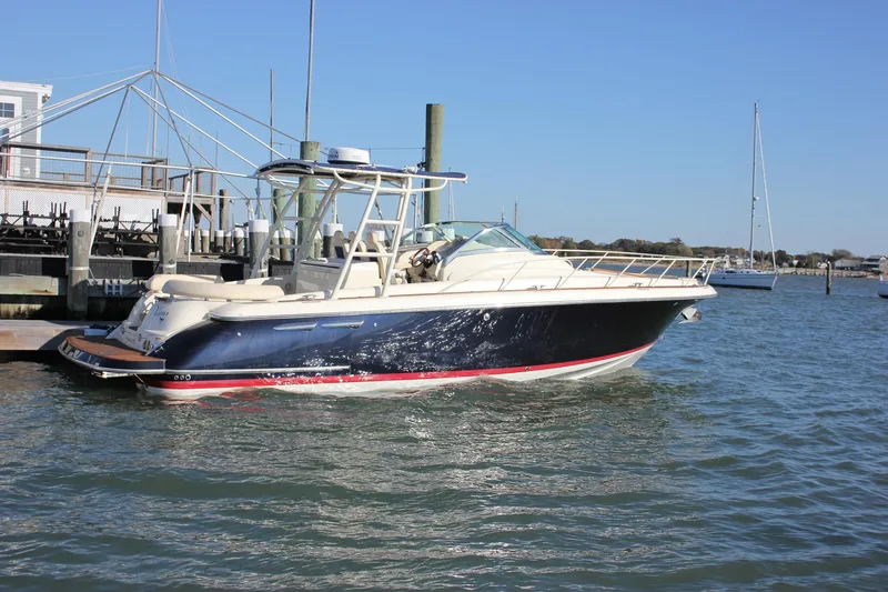 Slide: The Image of Interior of 2017 Chris-Craft Launch 38, featuring a cozy cabin with modern design. - 83