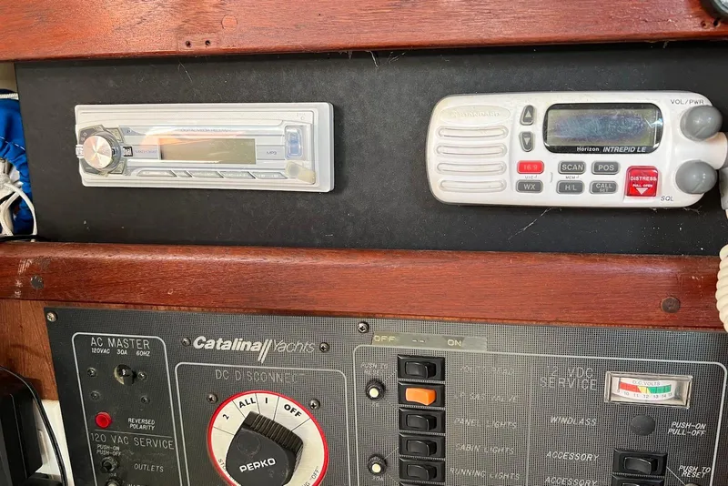 Slide: The Image of Control panel of a 1988 Catalina 34 mkI yacht with radio and stereo system. - 28
