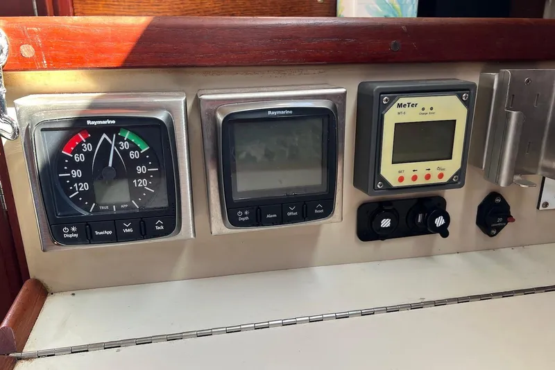 Slide: The Image of Control panel of a 1988 Catalina 34 mkI sailboat with Raymarine instruments. - 31