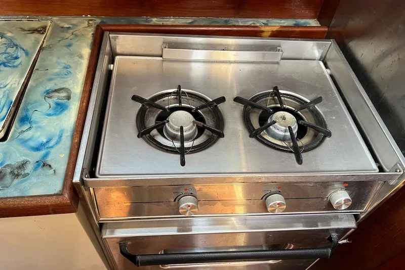 Slide: The Image of Stainless steel stove in 1988 Catalina 34 mkI yacht kitchen. - 34