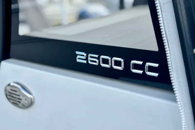 Slide: The Image of Close-up of 2025 Parker 2600 Center Console boat emblem. - 13