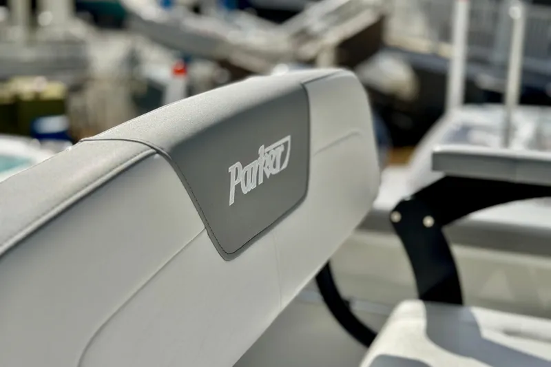 Slide: The Image of 2025 Parker 2600 Center Console boat seat with logo, close-up view. - 20