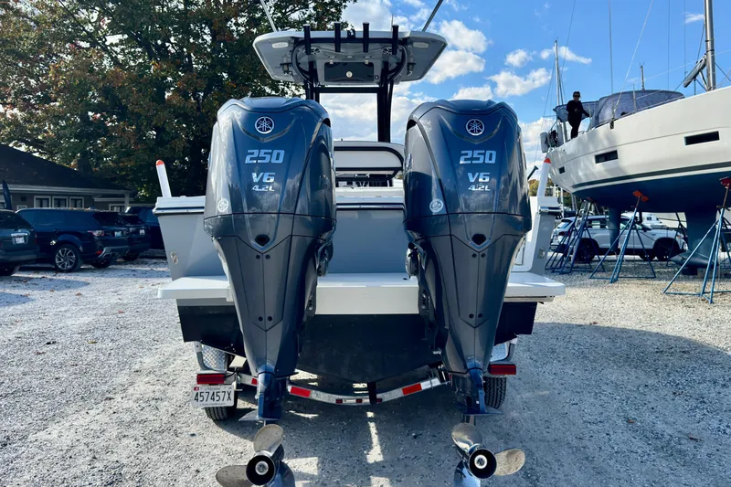 Slide: The Image of 2025 Parker 2600 Center Console with dual Yamaha 250 V6 outboard engines. - 32