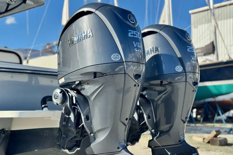Slide: The Image of Twin Yamaha 250 V6 outboard engines on a 2025 Parker 2600 Center Console boat. - 33