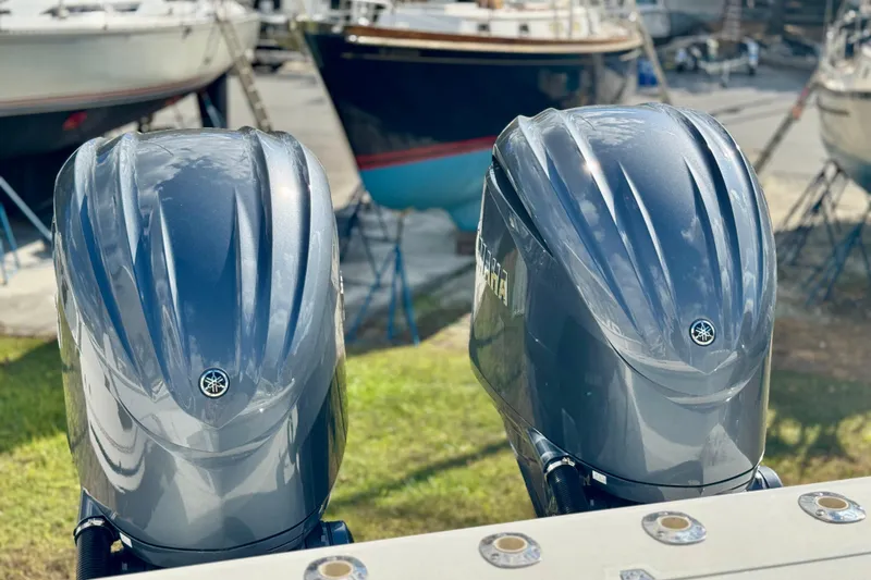 Slide: The Image of Twin Yamaha outboard engines on a 2025 Parker 2600 Center Console boat. - 39