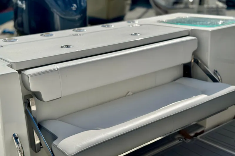 Slide: The Image of 2025 Parker 2600 Center Console boat with sleek white seating and modern design. - 40