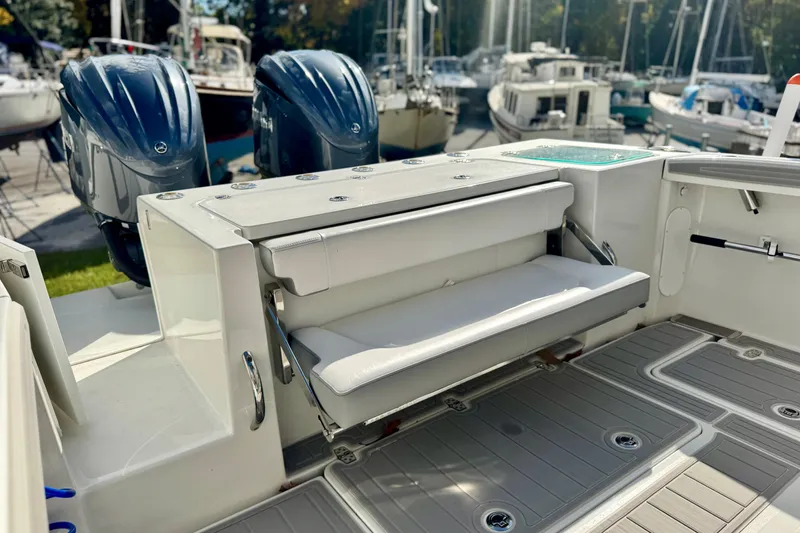 Slide: The Image of 2025 Parker 2600 Center Console boat with dual engines and foldable seating. - 41