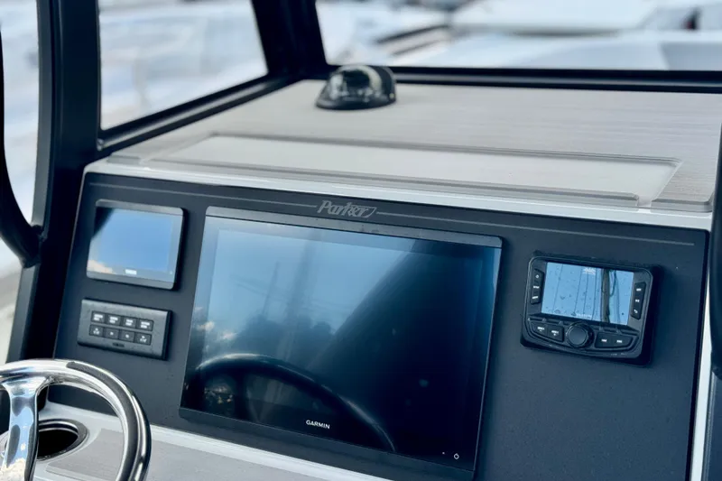 Slide: The Image of 2025 Parker 2600 Center Console dashboard with modern navigation and control systems. - 5