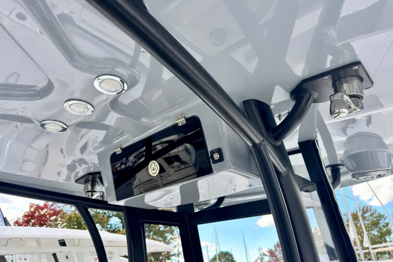 Slide: The Image of 2025 Parker 2600 Center Console boat interior with modern lighting and equipment. - 7