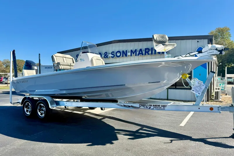 The Image of 2026 Key West 230 Bay Reef boat on trailer at marine dealership. - 0