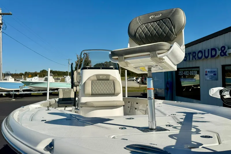 Slide: The Image of 2026 Key West 230 Bay Reef boat with cushioned seating and sleek design. - 10