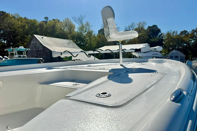 Slide: The Image of 2026 Key West 230 Bay Reef boat with elevated seat and Garmin equipment. - 11