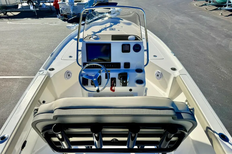 Slide: The Image of 2026 Key West 230 Bay Reef boat interior with steering console and seating. - 30