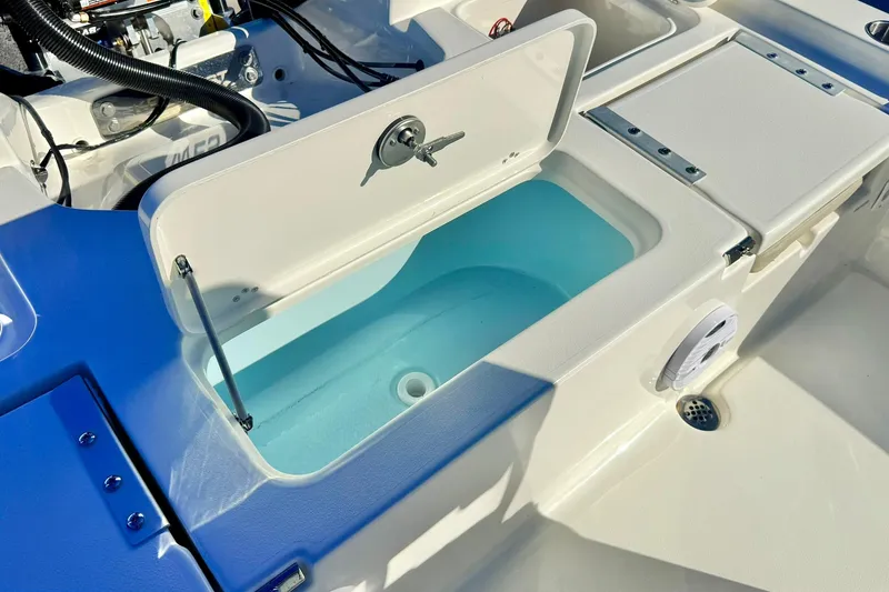 Slide: The Image of Livewell compartment on 2026 Key West 230 Bay Reef boat, featuring clean design and functionality. - 42