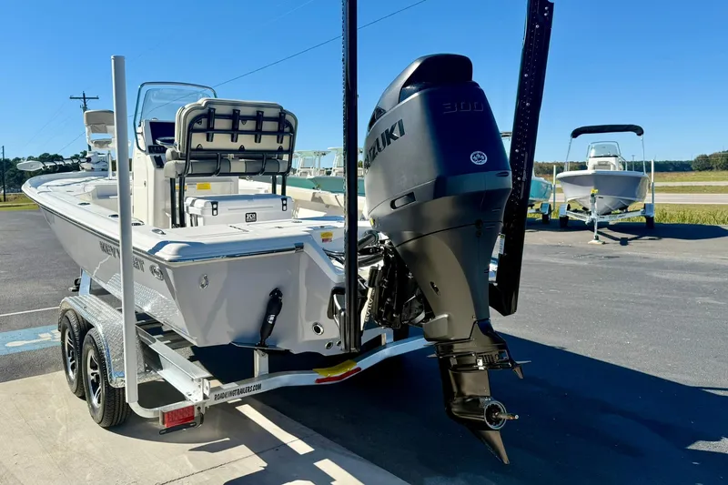 Slide: The Image of 2026 Key West 230 Bay Reef boat on trailer with Suzuki outboard motor. - 45