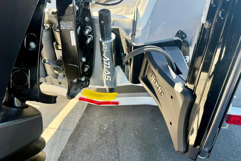 Slide: The Image of Close-up of 2026 Key West 230 Bay Reef boat motor components. - 46