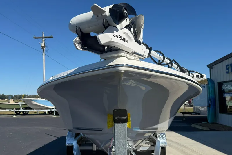 Slide: The Image of 2026 Key West 230 Bay Reef boat with Garmin equipment, displayed outdoors. - 8