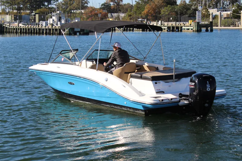 The Image of 2023 Sea Ray SPX 210 boat on water, featuring a sleek design and powerful outboard motor. - 0
