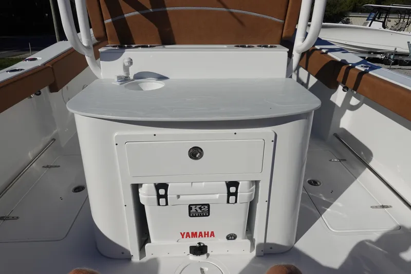 Slide: The Image of 2026 Sea Hunt Ultra 285 Coffin Box interior, featuring a spacious, clean compartment. - 13