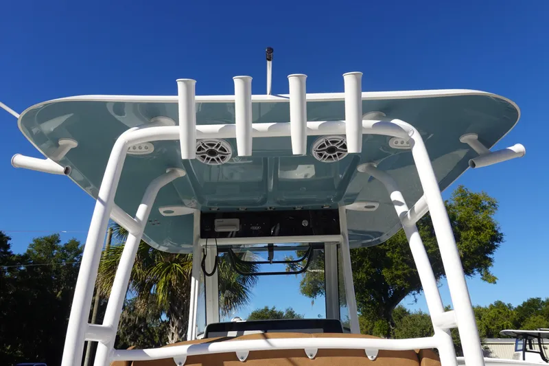 Slide: The Image of 2026 Sea Hunt Ultra 285 Coffin Box boat interior with Yamaha cooler and seating. - 14