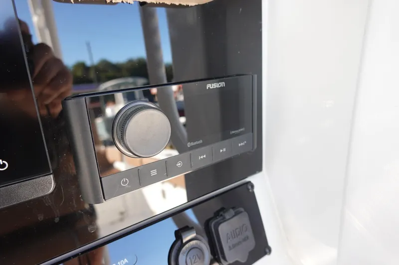 Slide: The Image of Steering console of 2026 Sea Hunt Ultra 285 Coffin Box with modern controls and displays. - 21