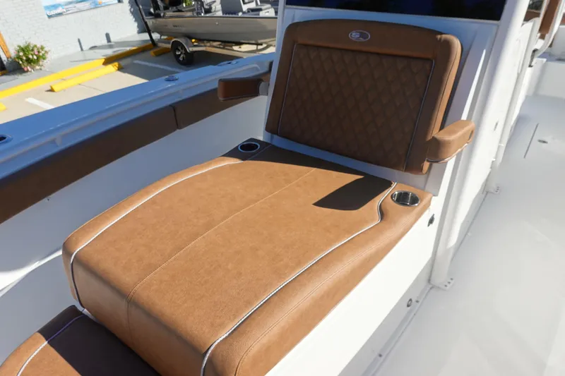 Slide: The Image of 2026 Sea Hunt Ultra 285 Coffin Box emblem on a sleek white surface. - 28