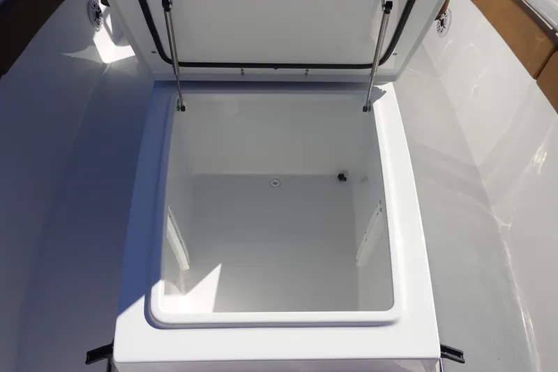 Slide: The Image of Open storage compartment on 2026 Sea Hunt Ultra 285 Coffin Box boat. - 32
