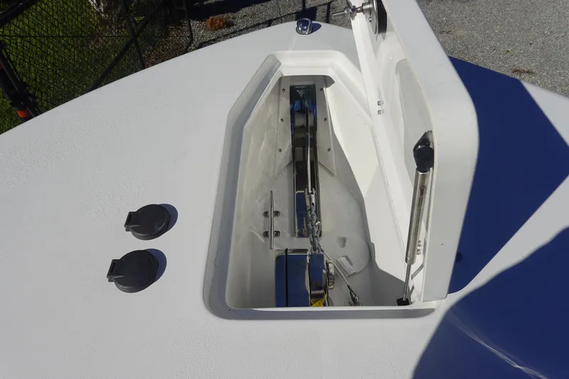 Slide: The Image of 2026 Sea Hunt Ultra 285 Coffin Box boat deck with storage hatch and fittings. - 36