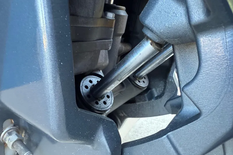 Slide: The Image of Close-up of 2017 NauticStar 2302 Legacy boat engine components. - 15