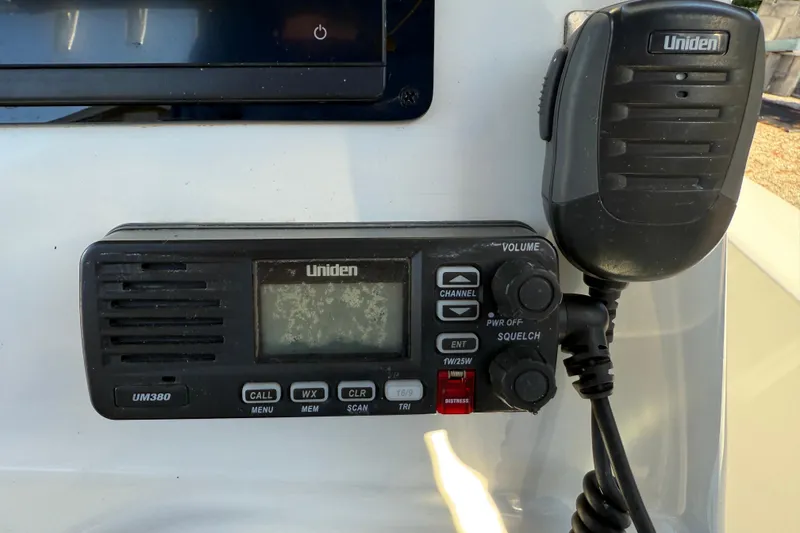 Slide: The Image of Uniden UM380 marine radio on 2017 NauticStar 2302 Legacy boat dashboard. - 42