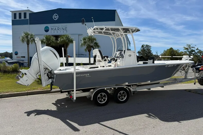 Slide: The Image of 2021 Tidewater 2500 Carolina Bay boat on trailer at Emerald Coast Marine Center. - 2
