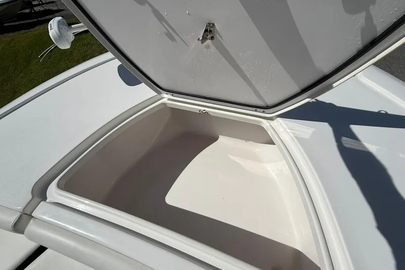 Slide: The Image of Open storage compartment on 2021 Tidewater 2500 Carolina Bay boat. - 9