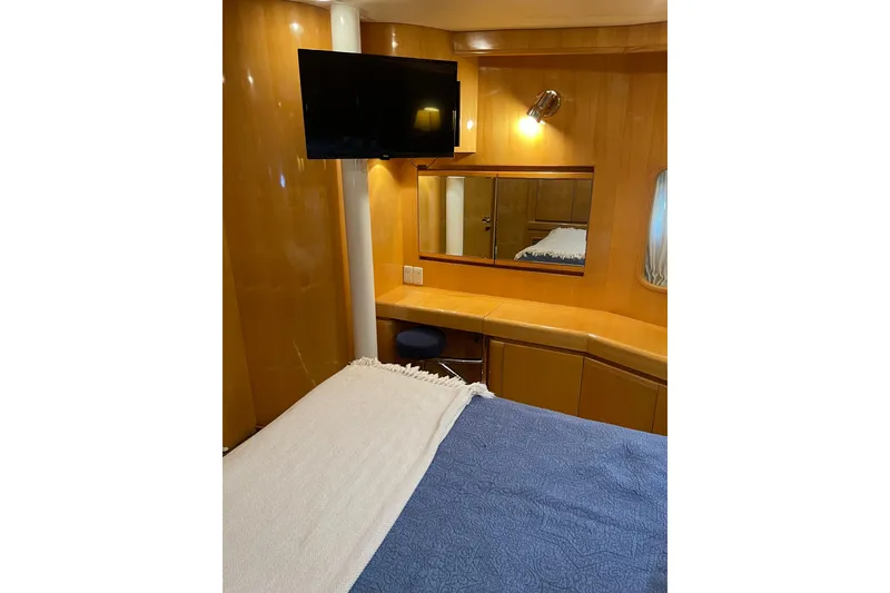 Slide: The Image of Luxurious cabin interior of 1995 JOHNSON 65 Flybridge Motoryacht with elegant bedding. - 107