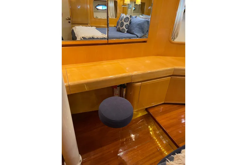 Slide: The Image of Bathroom interior of 1995 JOHNSON 65 Flybridge Motoryacht with sink and toilet. - 113