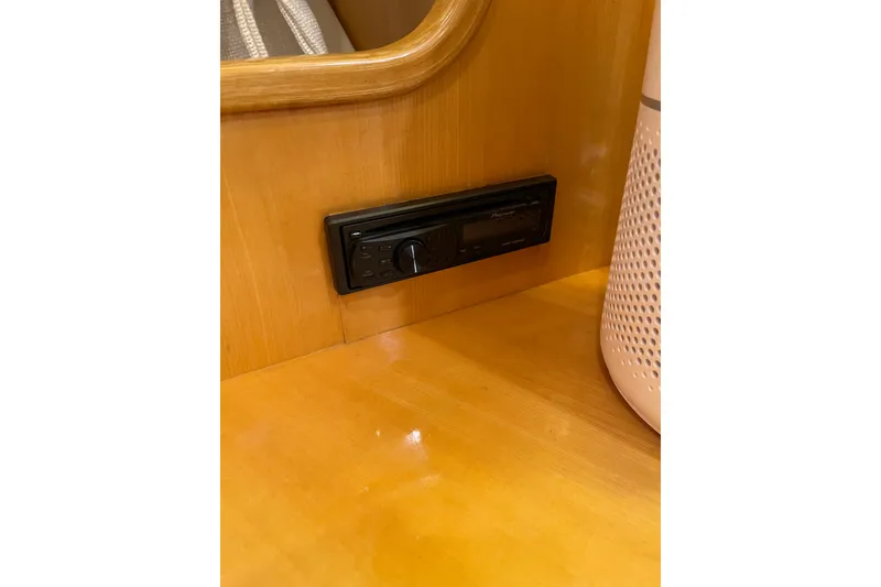 Slide: The Image of Ceiling interior of 1995 JOHNSON 65 Flybridge Motoryacht with elegant wood trim and lighting. - 117
