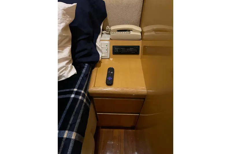 Slide: The Image of Interior ceiling of 1995 JOHNSON 65 Flybridge Motoryacht with wooden finish and lighting. - 119