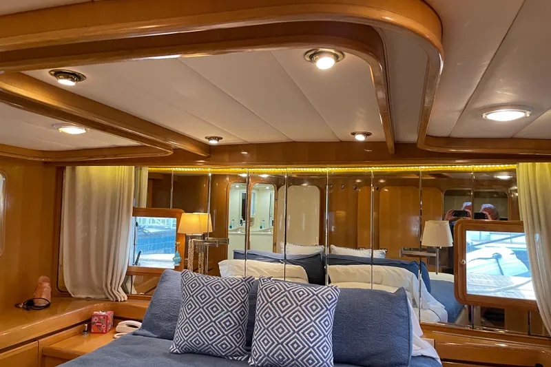 Slide: The Image of Luxurious bedroom interior of 1995 JOHNSON 65 Flybridge Motoryacht with elegant decor. - 135