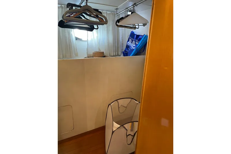 Slide: The Image of Luxurious bedroom interior of 1995 JOHNSON 65 Flybridge Motoryacht with elegant wood finishes. - 140