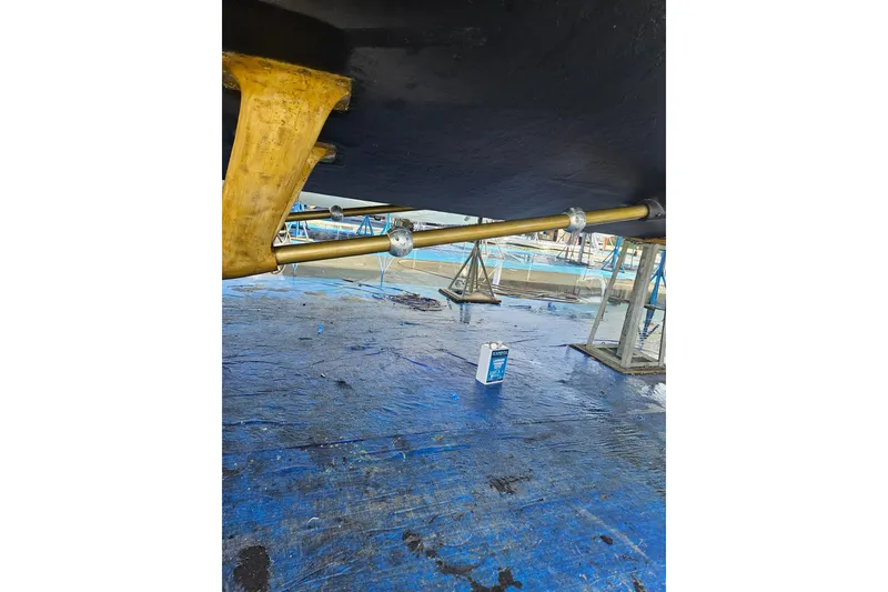 Slide: The Image of Interior view of 1995 JOHNSON 65 Flybridge Motoryacht with hangers and wooden flooring. - 147