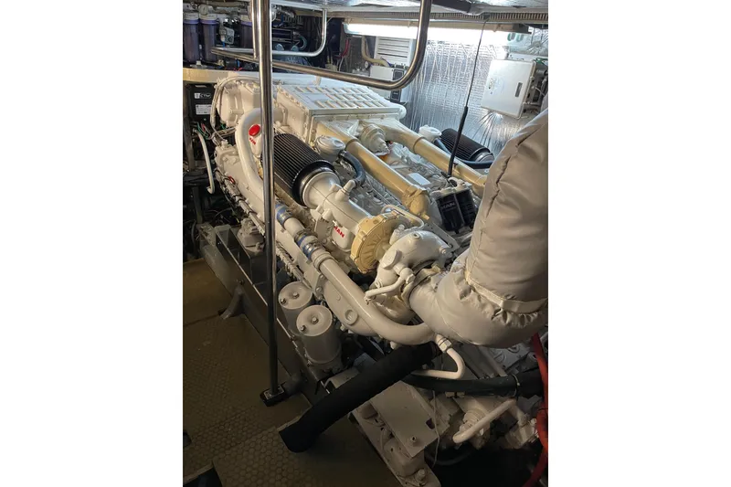 Slide: The Image of 1995 JOHNSON 65 Flybridge Motoryacht on lift at marina, undergoing maintenance. - 151