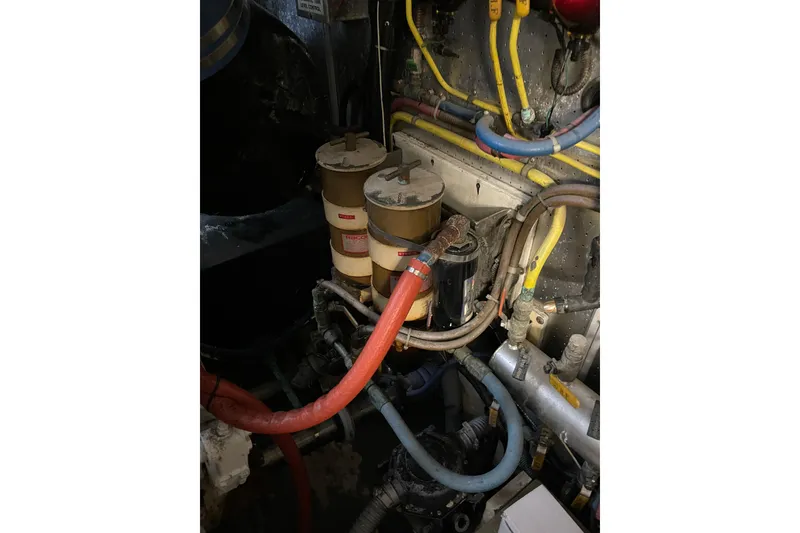 Slide: The Image of Control panel and wiring inside a 1995 JOHNSON 65 Flybridge Motoryacht engine room. - 165