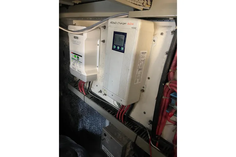 Slide: The Image of Engine room of 1995 JOHNSON 65 Flybridge Motoryacht with wiring and fuel filters. - 167