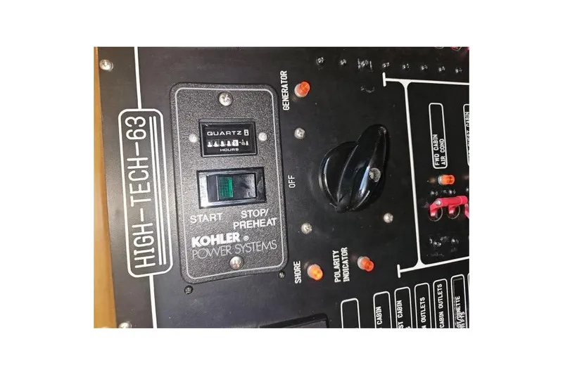 Slide: The Image of Electrical system inside a 1995 JOHNSON 65 Flybridge Motoryacht, featuring chargers and wiring. - 168