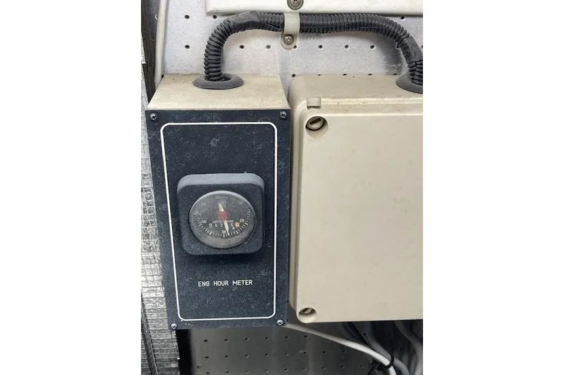 Slide: The Image of Engine hour meter on 1995 Johnson Flybridge Motoryacht dashboard. - 178