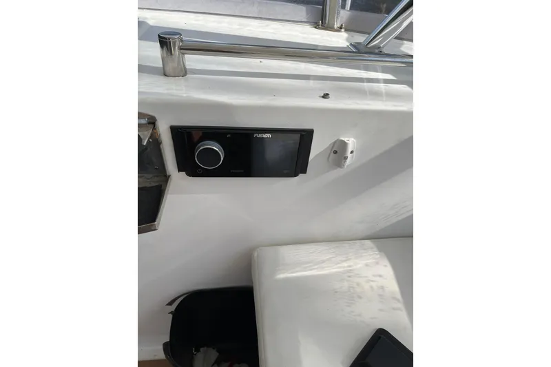 Slide: The Image of Garmin navigation display on 1995 JOHNSON 65 Flybridge Motoryacht showing map and coordinates. - 42