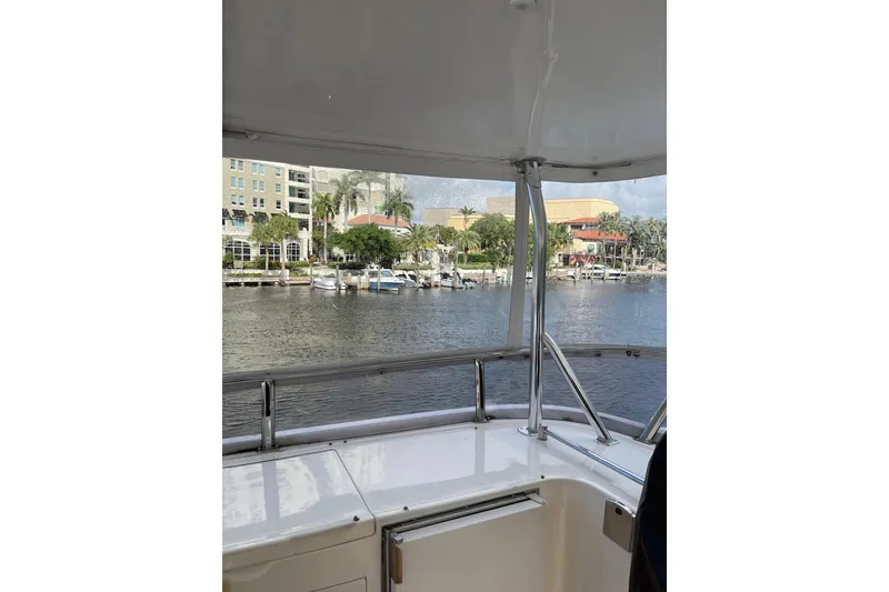 Slide: The Image of ICOM VHF Marine IC-M330 radio on 1995 JOHNSON 65 Flybridge Motoryacht dashboard. - 43