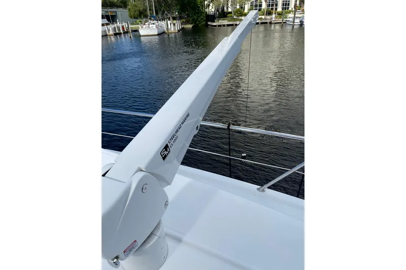 Slide: The Image of Interior view of 1995 JOHNSON 65 Flybridge Motoryacht with chrome railing and clear windows. - 47