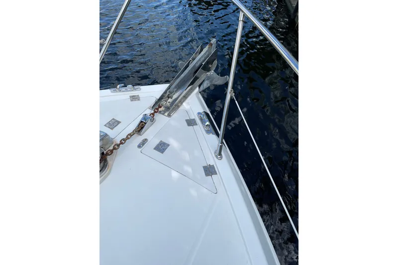 Slide: The Image of Deck of 1995 JOHNSON 65 Flybridge Motoryacht with hatch and fittings. - 51