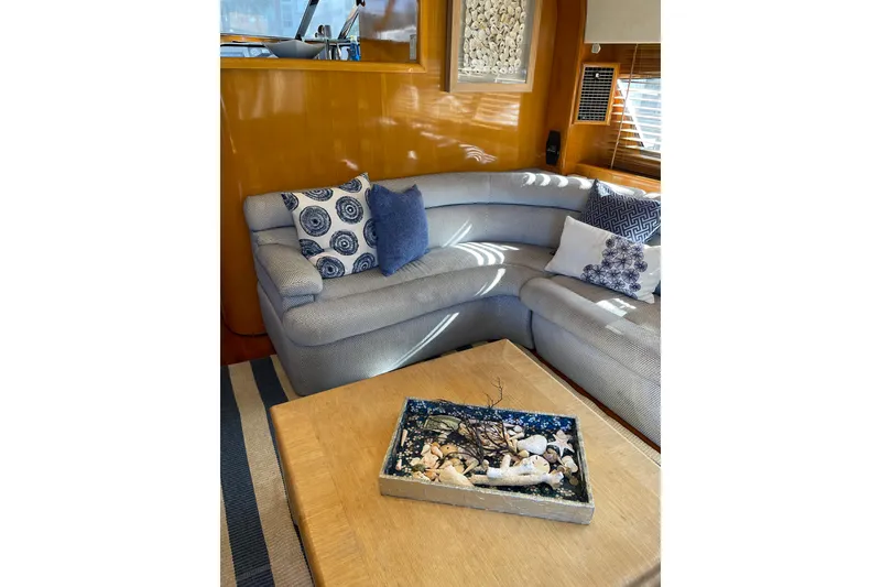 Slide: The Image of Bow of 1995 JOHNSON 65 Flybridge Motoryacht with anchor and railing. - 56