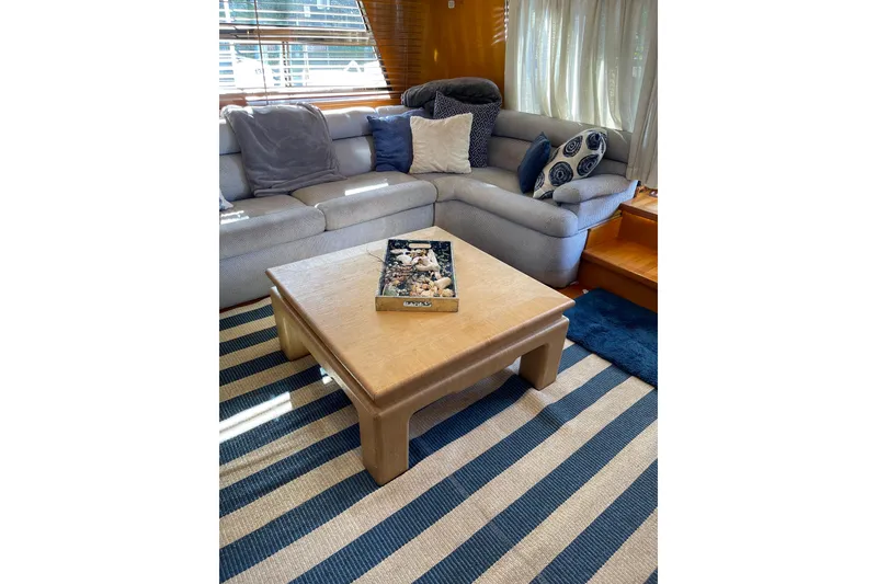 Slide: The Image of Open hatch on 1995 Johnson Flybridge Motoryacht, revealing interior access. - 57